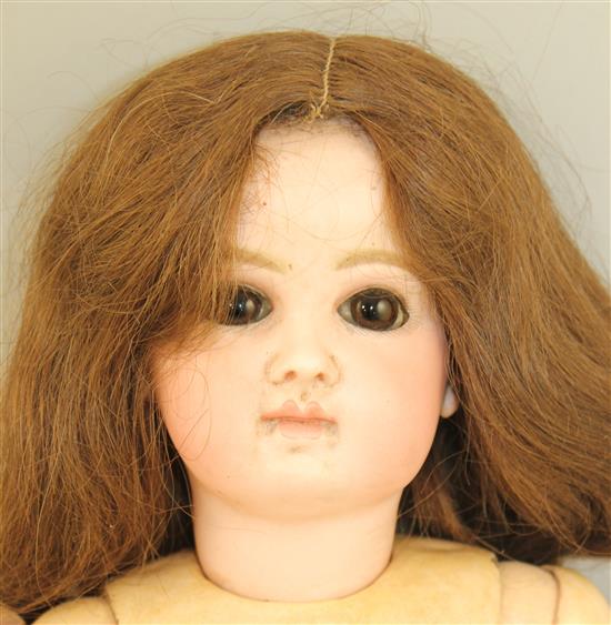 A Jumeau bisque head Bebe doll,